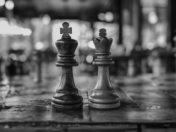 2 chess pieces, a king and queen