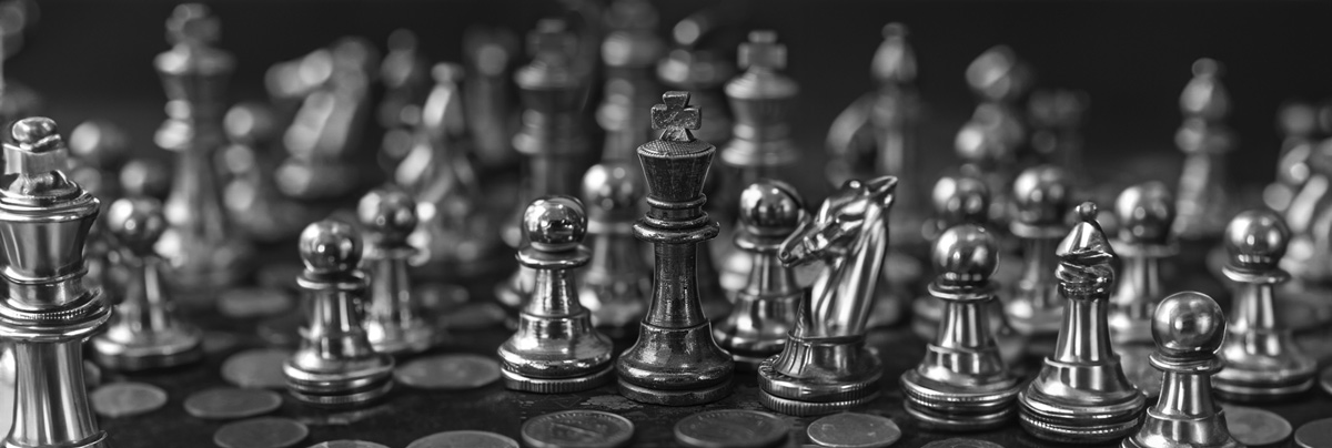 chess pieces and coins